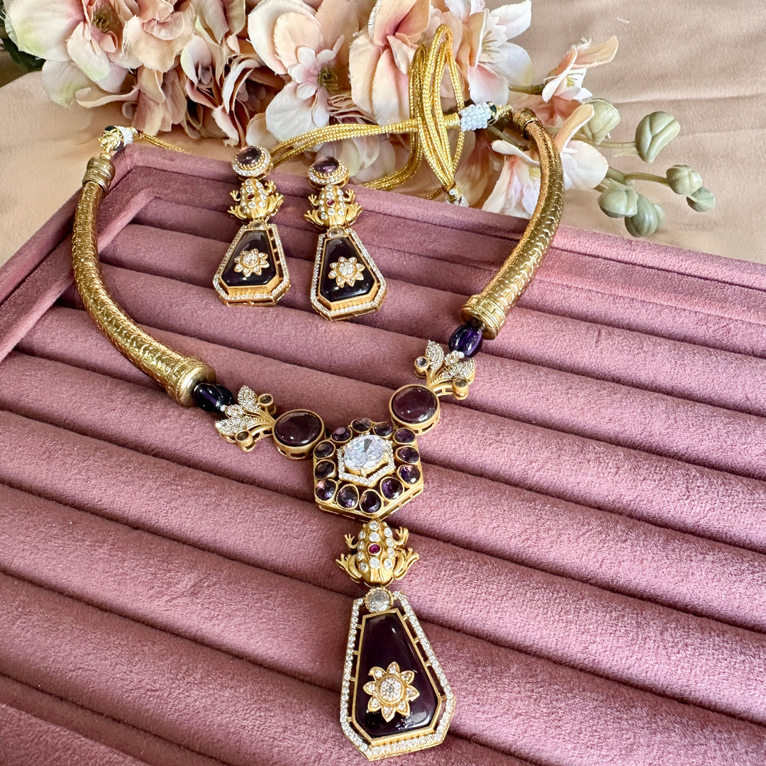 Akshita Purple Kundan Hasli Set