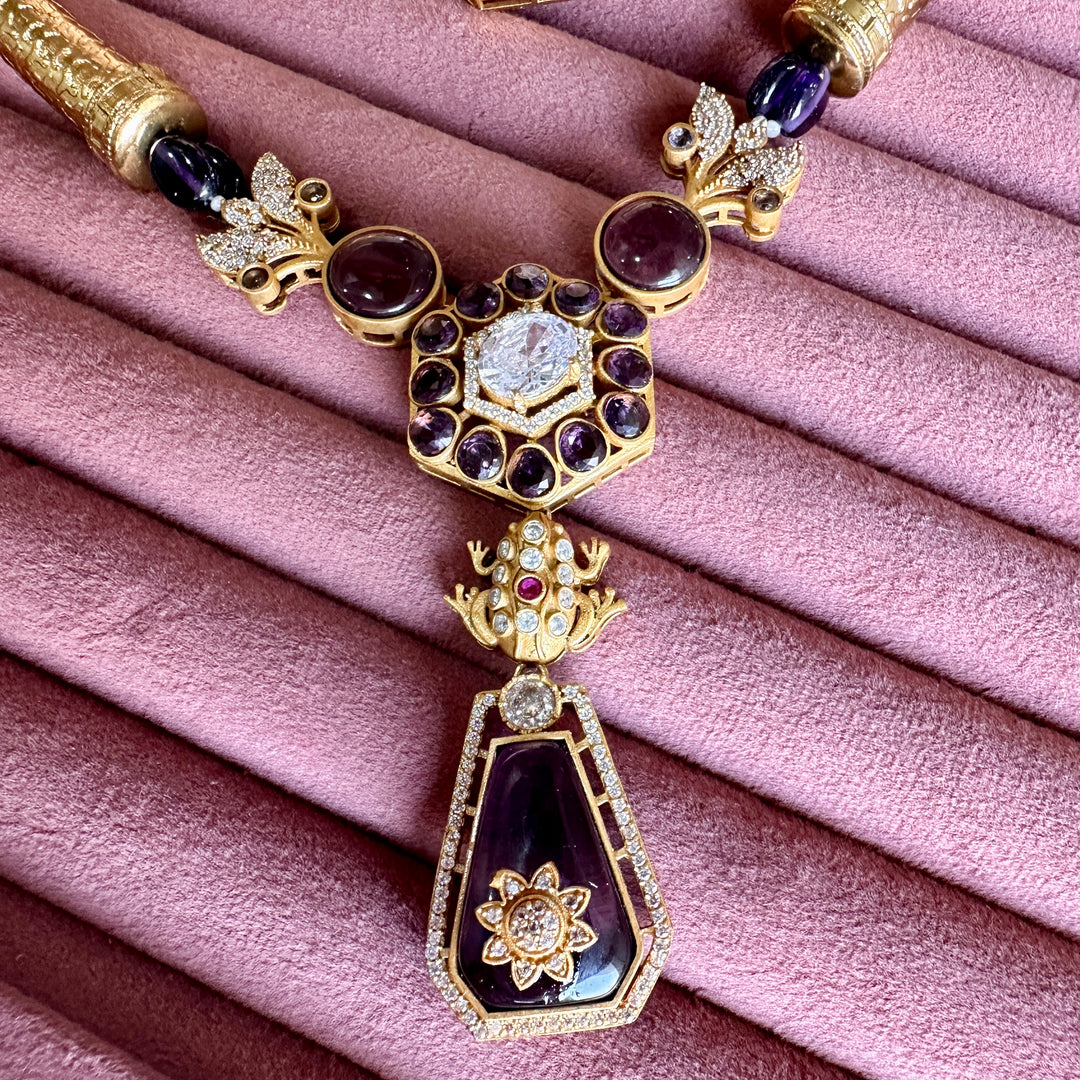 Akshita Purple Kundan Hasli Set